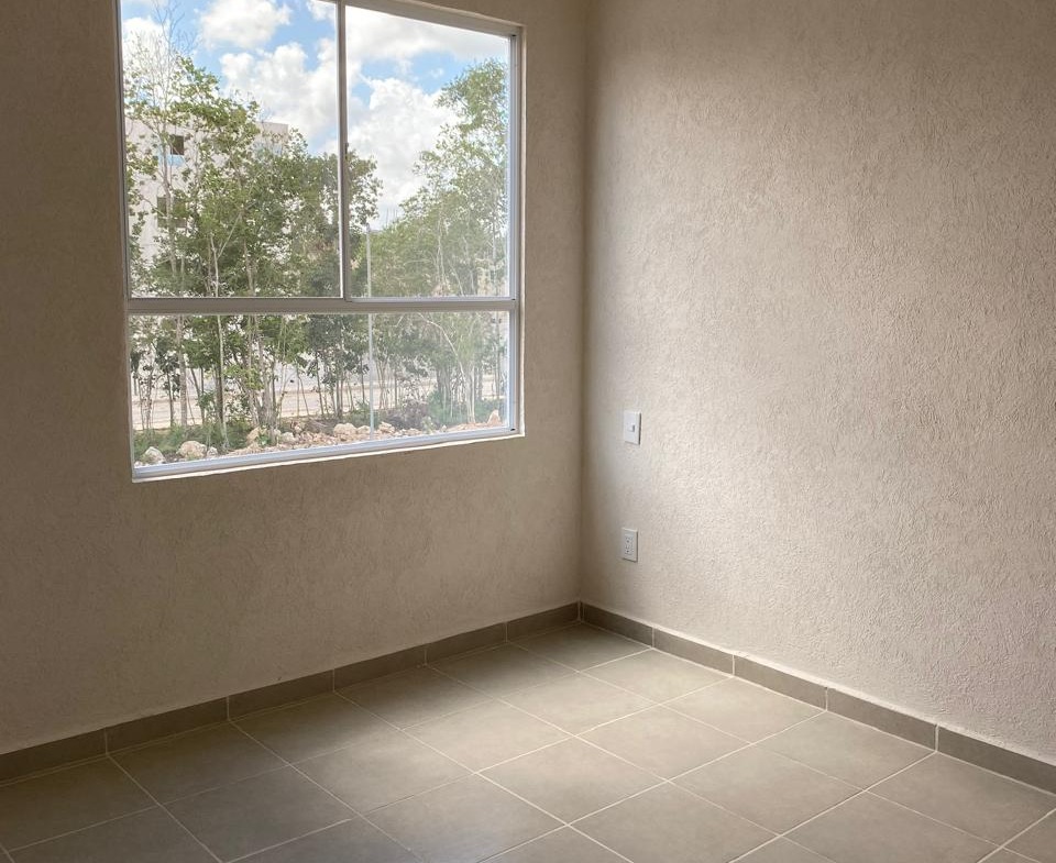 Departamento en venta en Cancún en Residencial Turquesa. 2 recámaras, seguridad 24 horas y amenidades cerca del Hospital General.