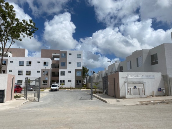 Departamento en venta en Cancún en Residencial Turquesa. 2 recámaras, seguridad 24 horas y amenidades cerca del Hospital General.