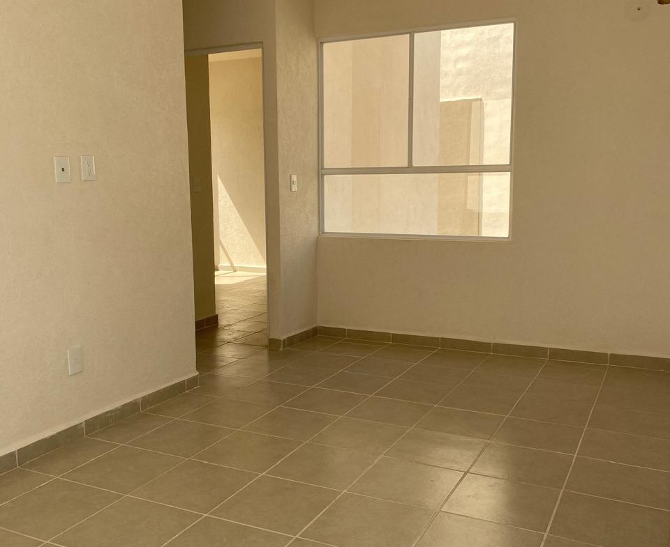 Departamento en venta en Cancún en Residencial Turquesa. 2 recámaras, seguridad 24 horas y amenidades cerca del Hospital General.