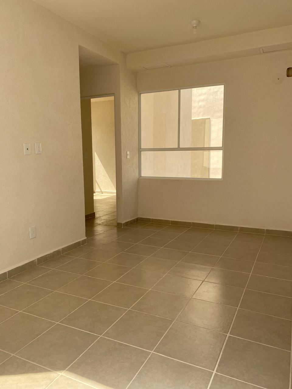 Departamento en venta en Cancún en Residencial Turquesa. 2 recámaras, seguridad 24 horas y amenidades cerca del Hospital General.