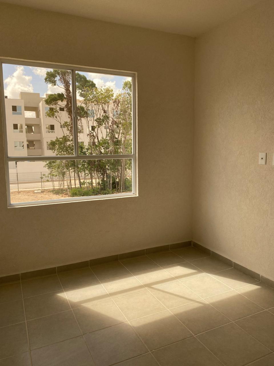 Departamento en venta en Cancún en Residencial Turquesa. 2 recámaras, seguridad 24 horas y amenidades cerca del Hospital General.