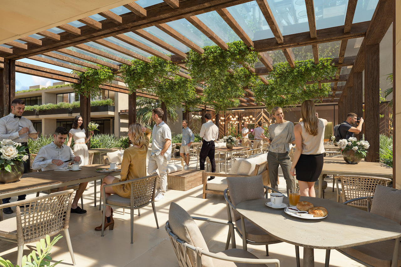 Terraza panorámica de Kharma Plaza con áreas de convivencia, descanso y vistas abiertas.