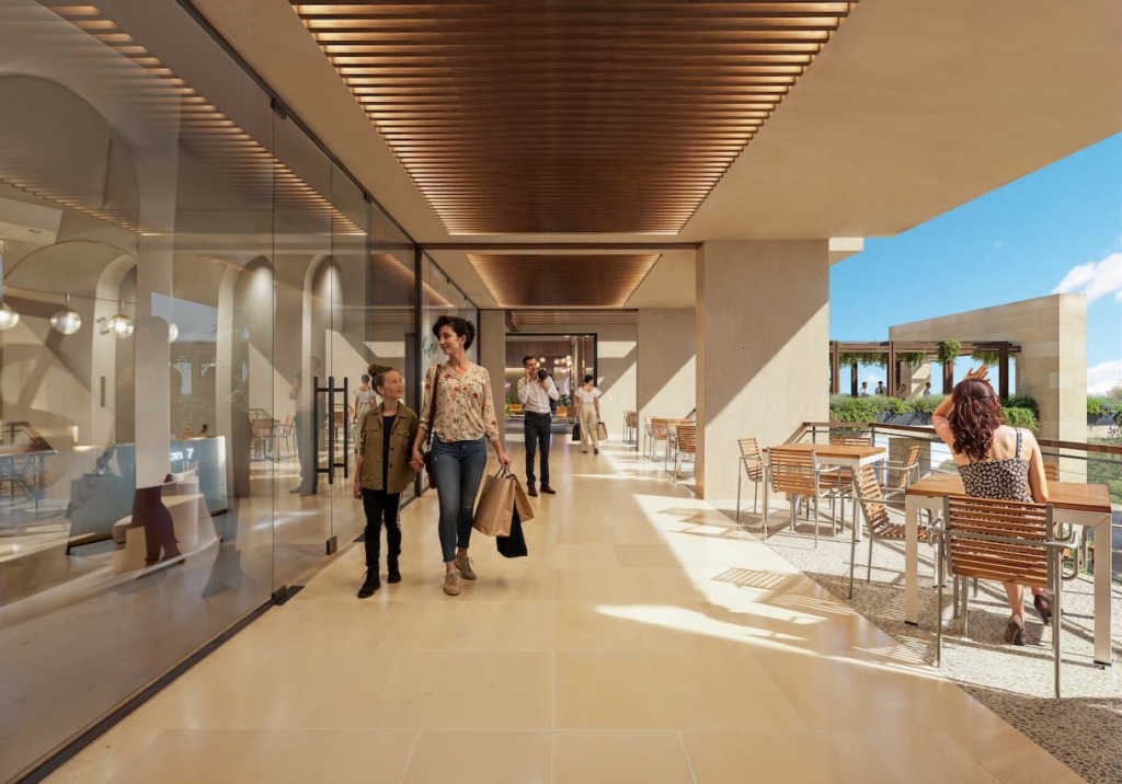 Corredor comercial con locales y terrazas en Kharma Plaza, Zona Diamante, Playa del Carmen