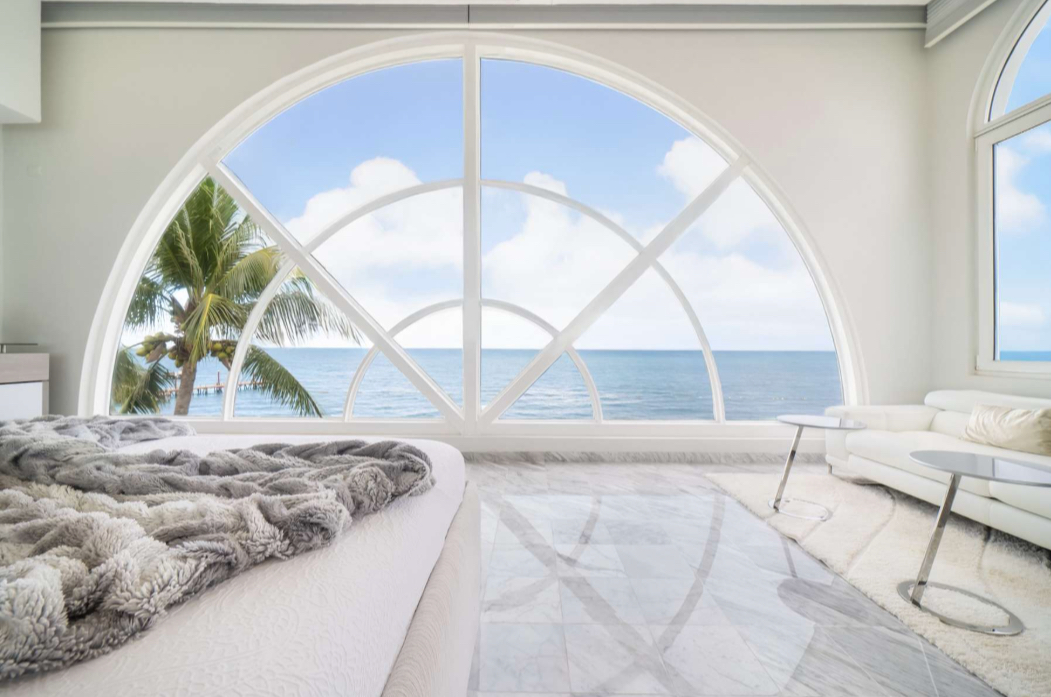 Villa de lujo frente al mar en Privada Albatros Zona Hotelera Cancún con acceso directo a la playa y vistas al Mar Caribe